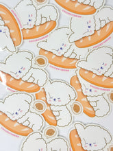 Load image into Gallery viewer, Stickers of cartoonish sheep on bread with a white background