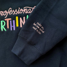 Load image into Gallery viewer, Navy blue sweatshirt with colorful text and a quote on a dark background