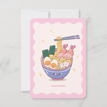 Load image into Gallery viewer, A playful mini art print of a blue ramen bowl with a face, filled with noodles, eggs, and Bibo dog characters as shrimp tempura and narutomaki.